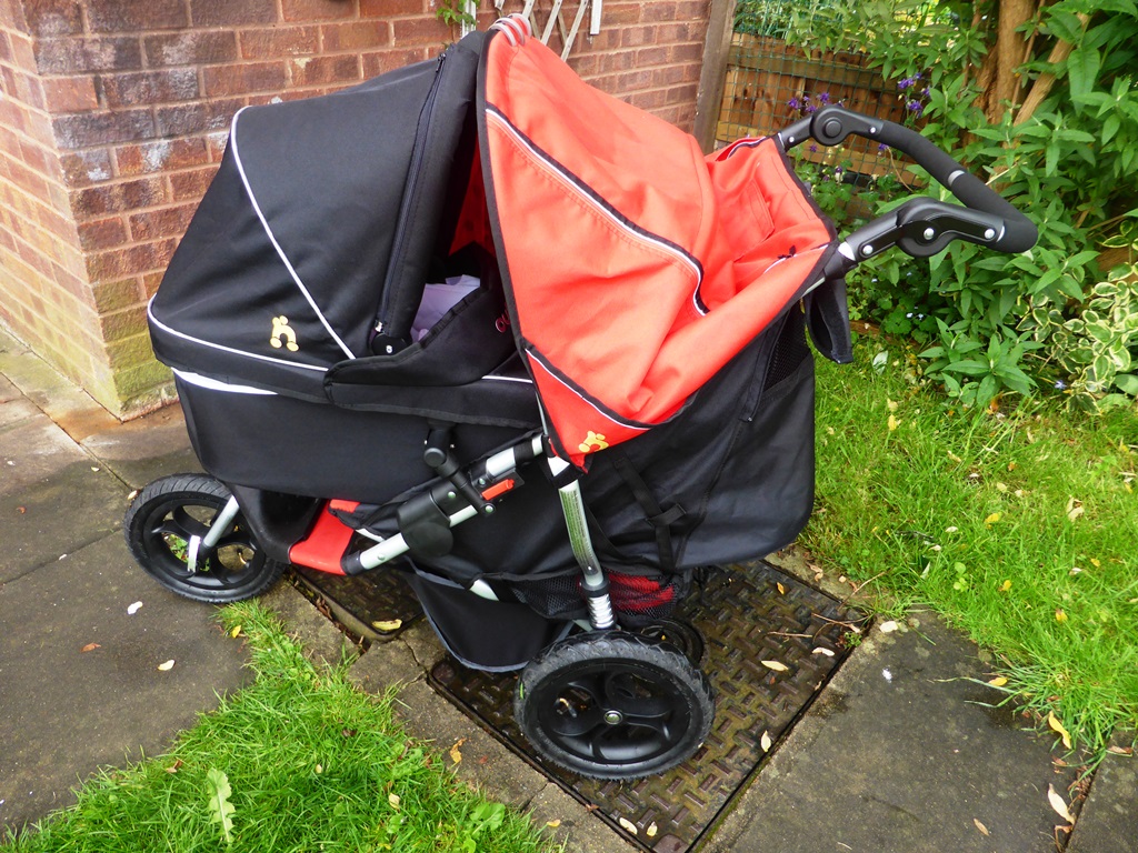 out and about double buggy with carrycot