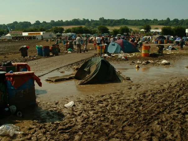 mangled muddy tent at glastonbury camping badly